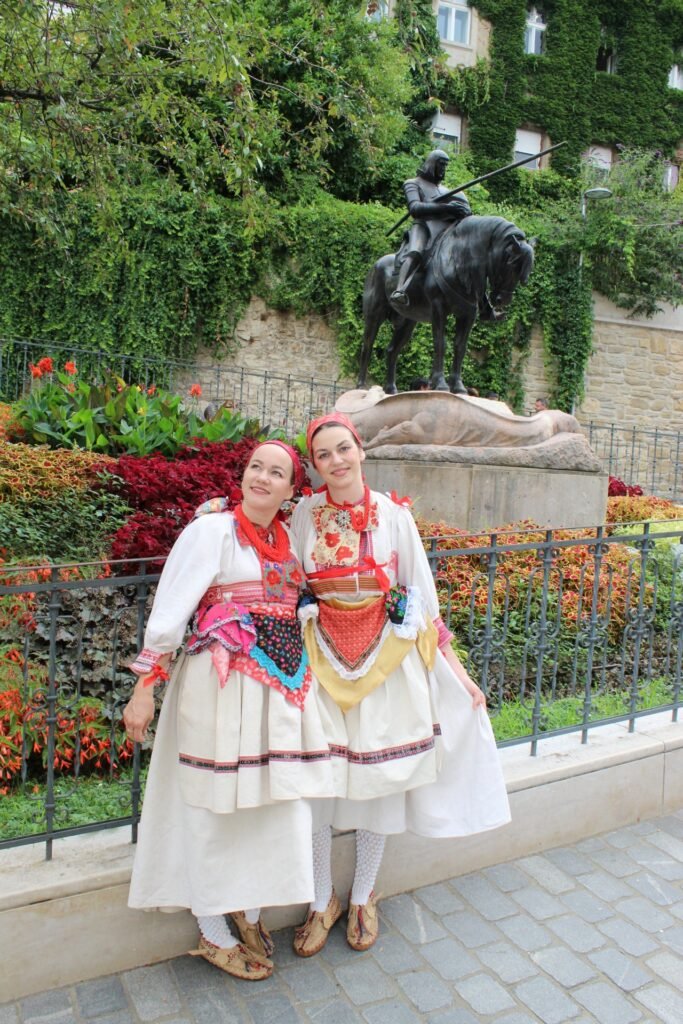 2 ladies in front of Sv. Juraj Winder