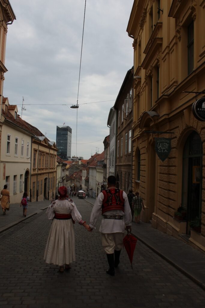 a couple walking down Tkalča